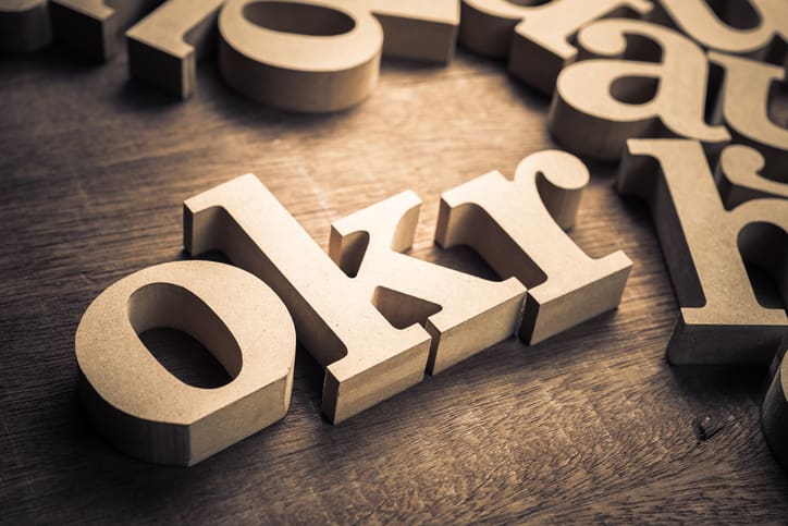 OKR spelled with letter cutouts. Credit: patpitchaya