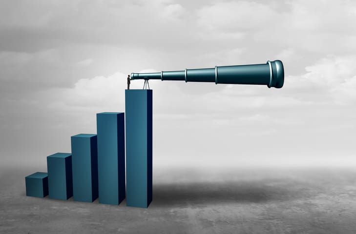 An upward trending bar chart with a telescope on the end looking to the future. CREDIT: wildpixel