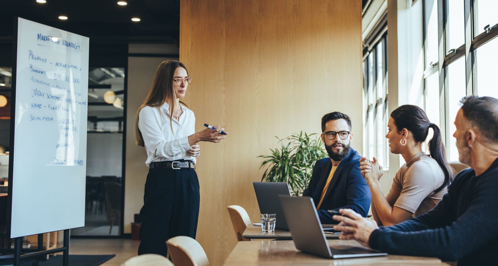 An Evidence-Based Leadership team working on their strategy. CREDIT: https://www.istockphoto.com/portfolio/jacoblund